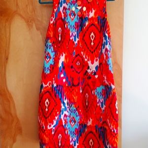 NWOT Belle Badgley Mishka fully lined dress. Vibrant, colorful print.